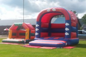 Absolutely Inflatables Bouncy Castle and Hot Tub Hire Inflatable Slide Hire Profile 1