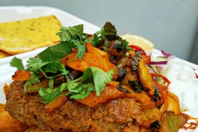 Tandooir Spiced Lamb Roasted sweet papers and mintn