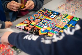 A mosaic building activity at one of our past events
