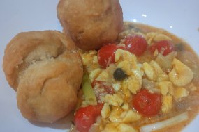 Ackee and saltfish with fried dumplings 