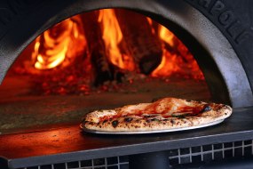 Fresh hand Dough cooked in our wood fired oven