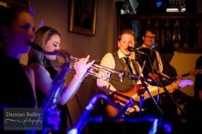 Female horn section. Live Party band