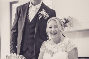 Ruth and Dave thoroughly enjoyed their wedding day! They couldn't stop laughing whilst signing the register!