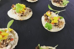 Jerk Pork with mango salsa on tostada
