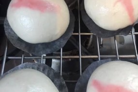 Chinese steamed buns filled with honey soy pork
