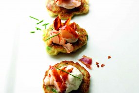 Pea blinis with lobster and pancetta
