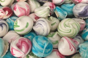 Beautiful meringue kisses, served with berries & cream