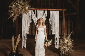 Rustic arch, macrame, dried flower arrangements
