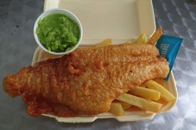Fish chips , mushy peas