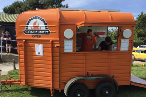 Our famous orange pizza van, homemade by ourselves! 