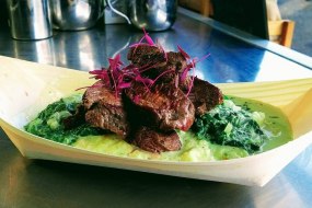 Ostrich Steak with Nutmeg Creamed Spinach and Miele Meal