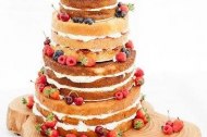 Naked wedding cake with fresh berries