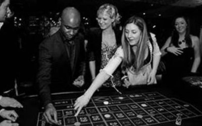 Roulette table and guests placing their bets