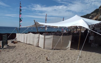 Beach wedding in a stretch tent
