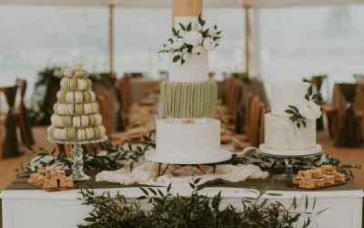 Cake and dessert table with macarons and blondies.