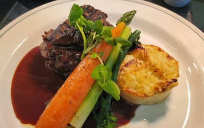 Slow roasted beef fillet, seasonal veg, dauphinoise and rich red wine jus