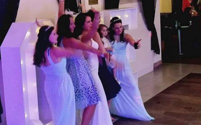 The Bride and bridesmaids having a blast 