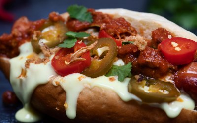 Close up of our signature Chilli Cheese Dog