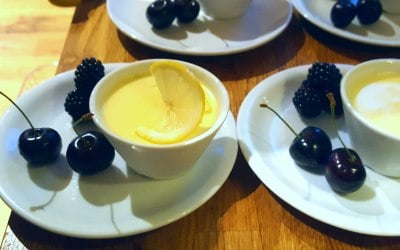 Rich yet delicate lemon posset served with berries and a shortbread