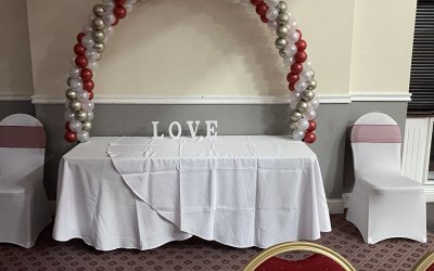 Ruby, white gold and pearl white dessert table arch