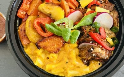 Mac and cheese poke bowls with jerk chicken and tropical side 