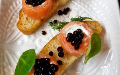Smoked salmon roll and créme fraiche on focaccia crostino and soy caviar
