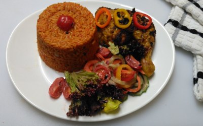 Classic Jollof Rice, Grilled Chicken Leg with Mixed Salads. 