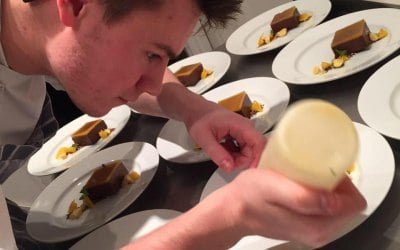 Chef Chris plating desserts
