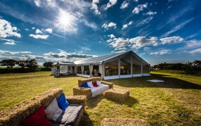 Wedding marquee with straw bale sofas!