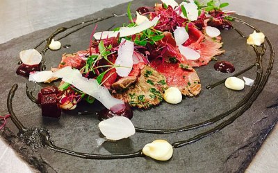 Venison carpaccio with cubed beetroot and parsnip pure