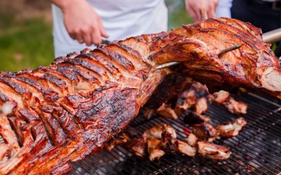 Hog Spit Roast - Our hog spit roast is cooked over traditional hot coals, ensuring an authentic and flavoursome experience.