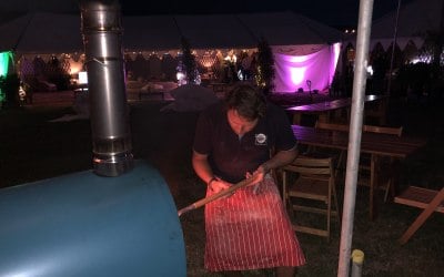 Making pizza at CarFest South 2018