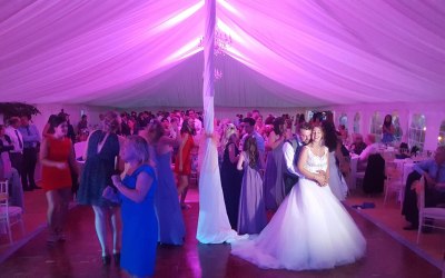 Marquee Wedding with Violet Up Lights