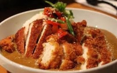 Chicken Katsu - Crispy fried chicken strips, slathered in a tasty Katsu curry sauce, Laced with crispy onions and chilli flakes