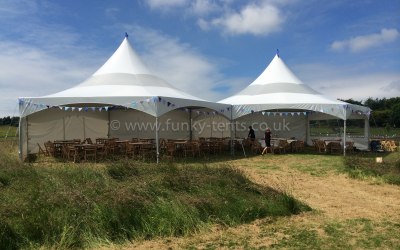2 Hex Marquees linked and opened up at the front for a summer lunch.