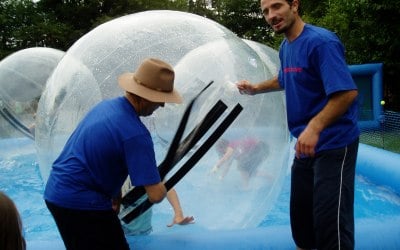 Exiting a waterzorb. Our staff wear logged shirts for ease of identification.
