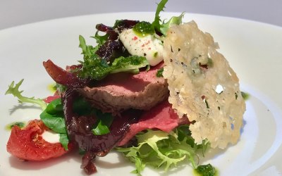 A light salad of fillet beef with horseradish cream and a parmesan crisp