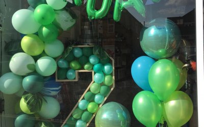 4ft Numbers Filled With Balloons along with a Balloon Garland and an Orbz Display.