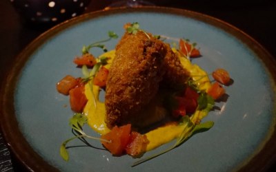 Pulled lamb croquette with aubergine puree and tomatoes