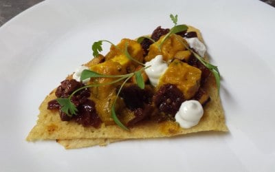 Squash masala with paneer on a dosa with aubergine chutney