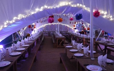 Capri marquee interior with uplighters and fairy lights