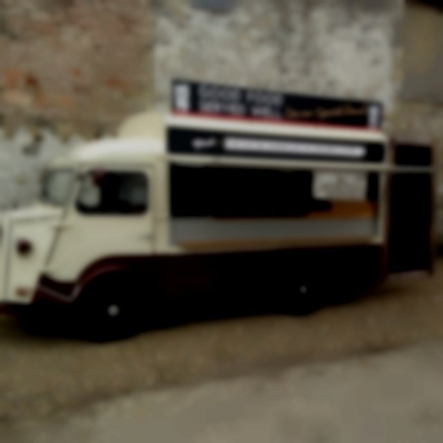 Vintage long wheel Citroen h vans. One is a coffee van and one a spicy chicken or veggie wrap can