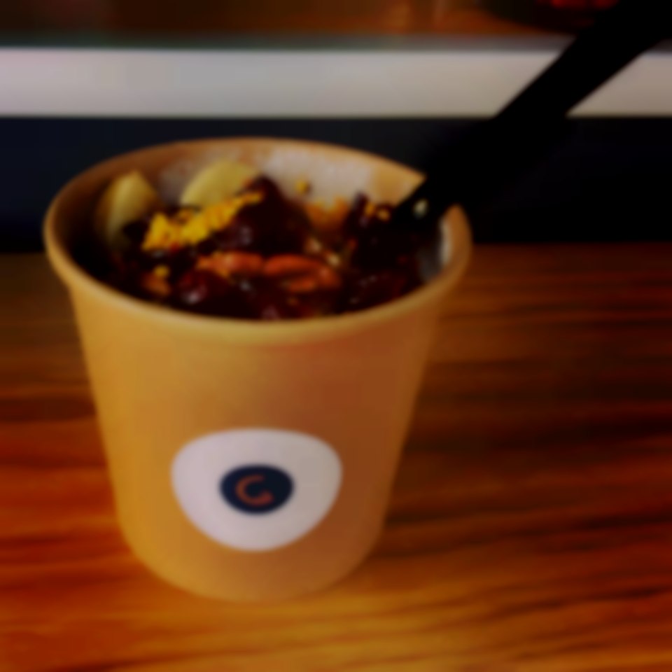 oatmeal with goji berries pecans cranberries and bee pollen