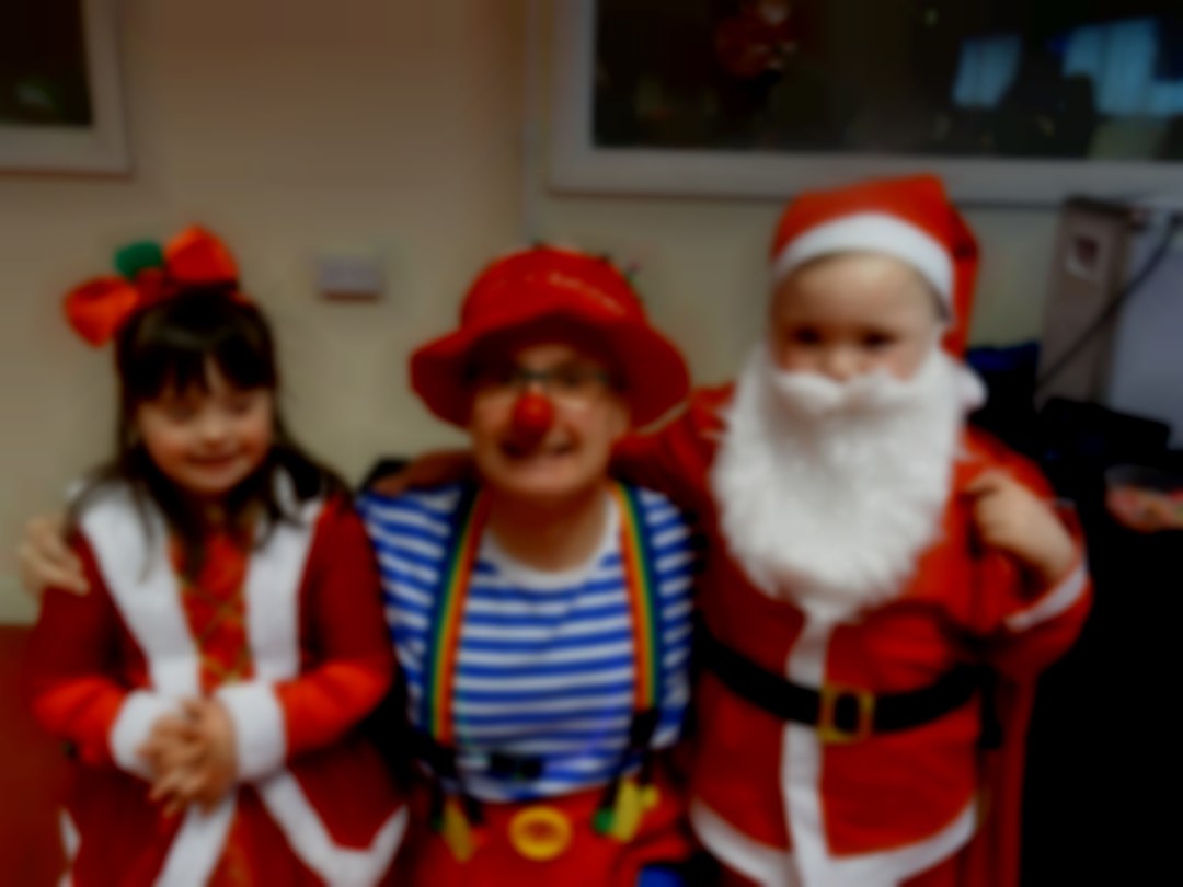 Mr Custard with the santa's helpers Bluenose Entertainments
