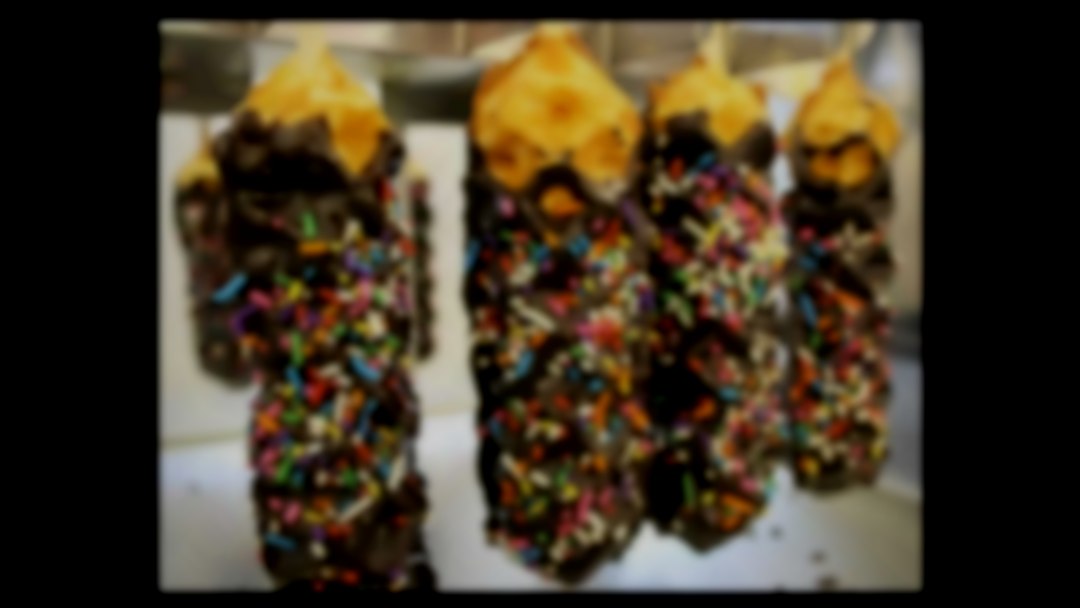 Fresh waffle on stick coated in Chocolate and 100/1000 Finished Chocolate waffle with 100/100