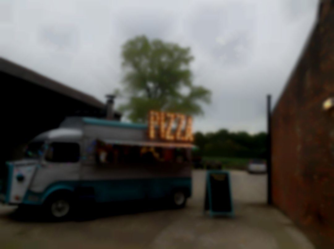 Pizza catering for an evening wedding Vintage van providing wood fired pizza for weddings