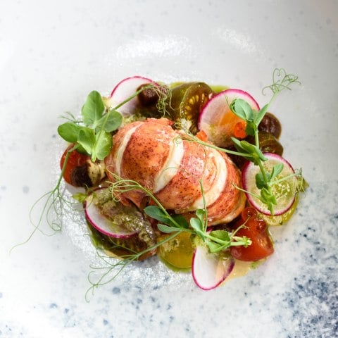 Lobster salad, heritage tomato, radish, bisque