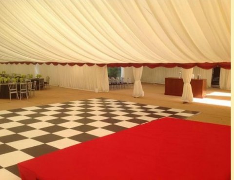 Large function for Hilton. Black and white dance floor. 15m wide marquee.