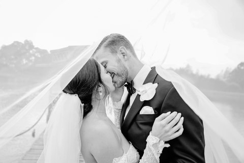 bride-and-groom-under-veil.jpg