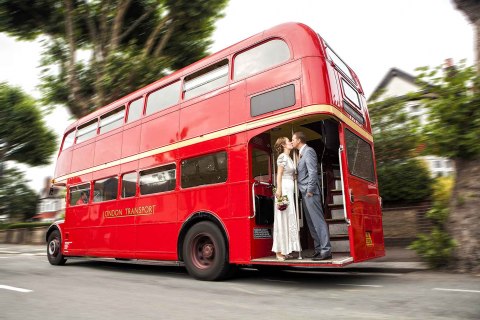 bride-and-groom-kissing-on-a-wedding-bus.jpg